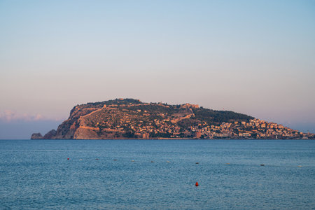 Beautiful sunrise scene on Alanya beachの写真素材