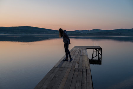 Woman on the pierの写真素材
