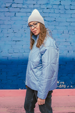 Portrait of a stylish woman in blue jacketの写真素材
