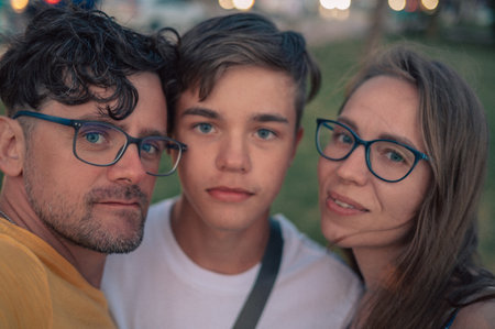 Happy family taking a photo in Alanya city, Turkey. Traveling or vacation conceptの写真素材