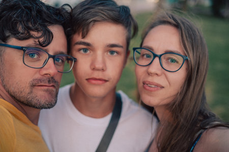 Happy family taking a photo. Traveling or vacation conceptの写真素材