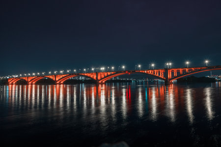 Night view of the famous bridge in Krasnoyarsk through the Yenisei River in Russia, Krasnoyarsk.の写真素材