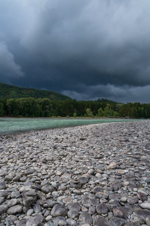 Fast mountain river Katun in Altay, Siberia, Russia. Cloudy skies before the rainの写真素材