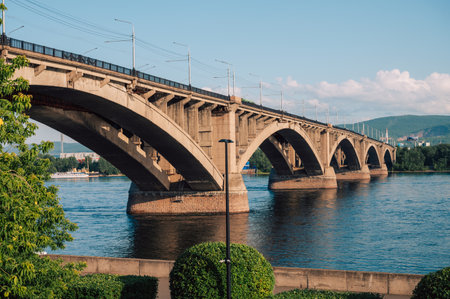Communal bridge over the Yenisei River at a beautiful sunny summer day in Krasnoyarsk city.の写真素材
