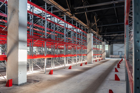 logistics warehouse concept with empty high pallet racks, shelving systemの写真素材