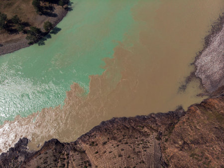 The confluence of two rivers, Katun and Chuya, the famous tourist spot in the Altai mountains, Siberia, Russia, aerial shot.の写真素材