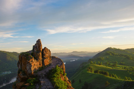 Beauty dawn on the peak, in the mountains in Altayの写真素材