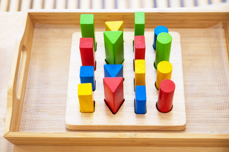 Stylish colorful wooden toy for child on wooden table.の写真素材