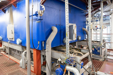 Modern industrial steam boiler room equiped for heating process.の写真素材