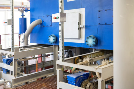 Modern industrial steam boiler room equiped for heating process.の写真素材