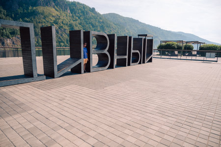 Man at the embankment of the Yenisei River in Divnogorsk town near Krasnoyarskの写真素材
