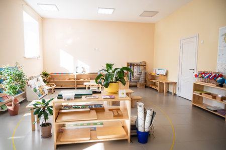 Montessori material. Wooden shelf with materials for Montessori studiesの写真素材