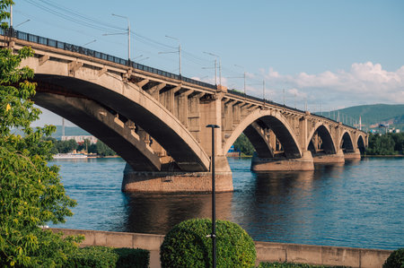 Communal bridge over the Yenisei River at beauty sunny summer day in Krasnoyarsk city.の写真素材