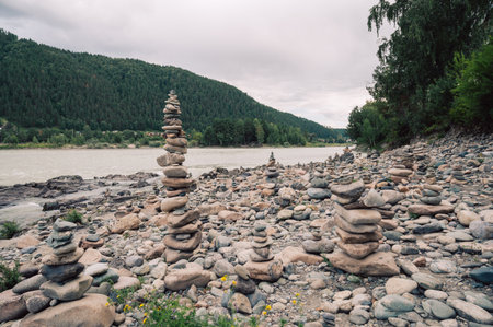 Woman at the river Katun at summer day. Trip on Altai Mountains in Altai Republicの写真素材