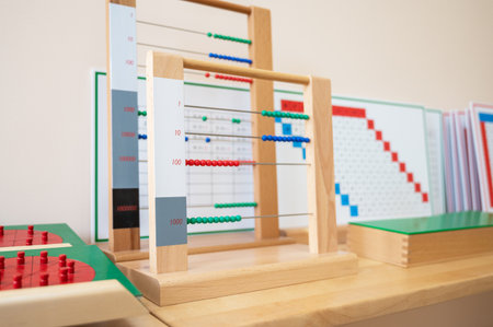 Montessori material. Wooden shelf with materials for Montessori studiesの写真素材