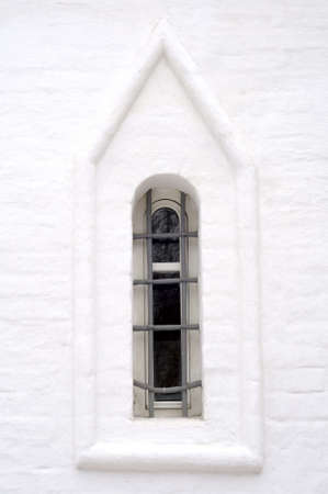 window in an old churchの写真素材