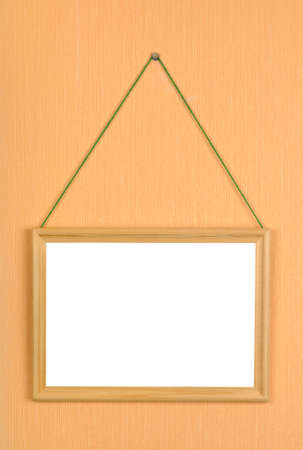 wood frame on the orange wallの写真素材