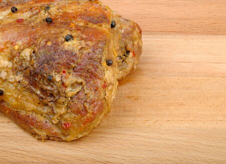 roasted piece of meat with spicesの写真素材