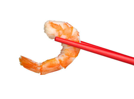 peeled shrimp in a chopstick isolated on a white backgroundの写真素材