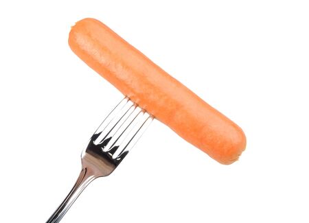 sausage on a fork isolated on white a backgroundの写真素材