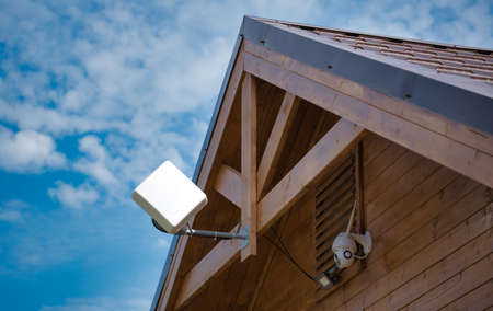 internet antenna and surveillance camera on the house