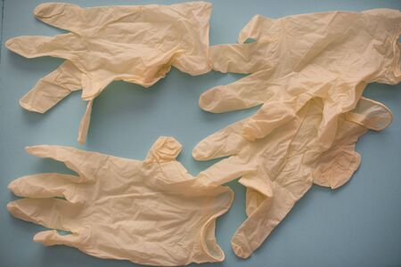 Latex gloves isolated against navy blue backgroundの写真素材