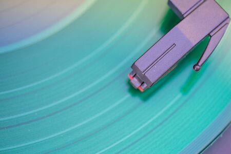 Close up shot of needle on vinyl record