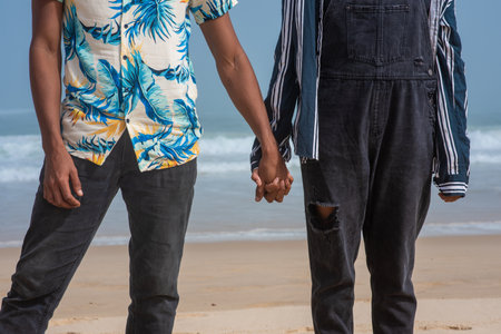 Cropped shot of couple holding handsの写真素材