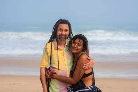 Portrait of happy couple embracing each other