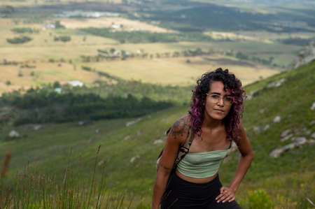 Close up shot of woman resting while taking a hike