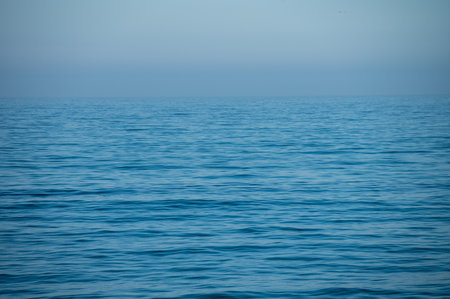 Peaceful ripples seen on pacific oceanの写真素材