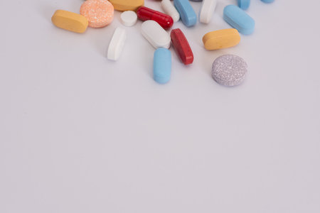 Close up shot of capsules and pills against white background