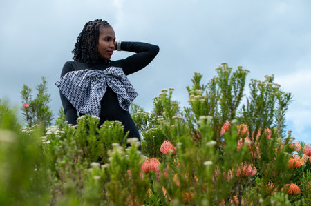 Portrait of woman seen standing in nature