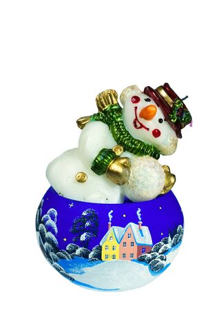 Christmas toy snowman in the form of multi-colored candlesの写真素材