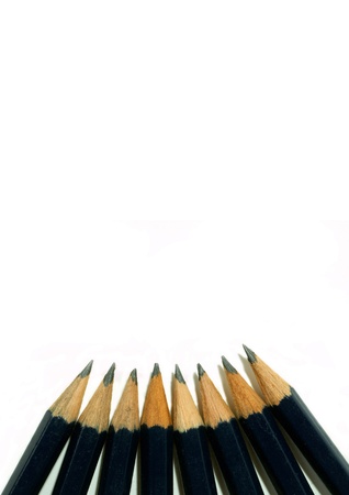 sharpened graphite pencils on a white backgroundの写真素材