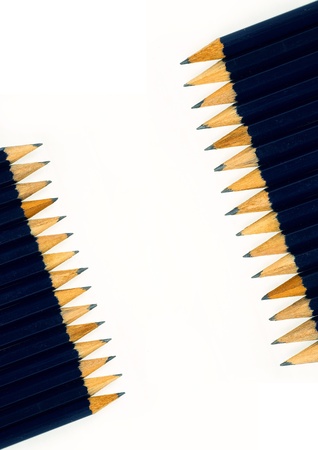 sharpened graphite pencils on a white backgroundの写真素材