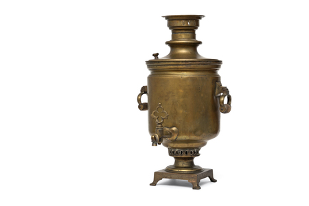 Large brass kettle on a white backgroundの写真素材