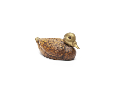 Duck sculpture a three-quarter on white backgroundの写真素材