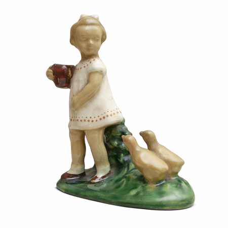 An old ceramic sculpture. Girl with anchovies and a jug on a white background.の写真素材