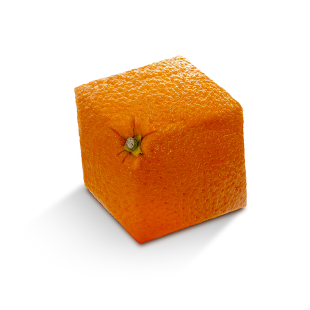 Angled bright ripe orange with a stalk on a white background and shadowの写真素材