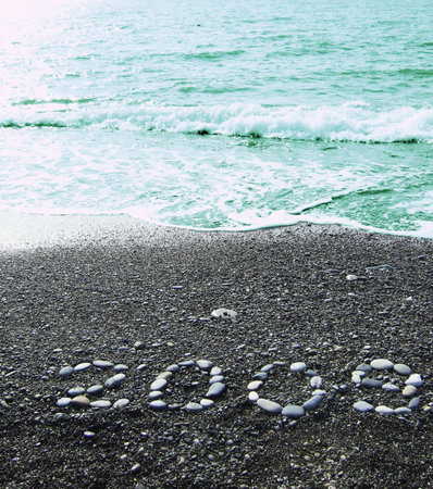 2009 from pebbles on a beach