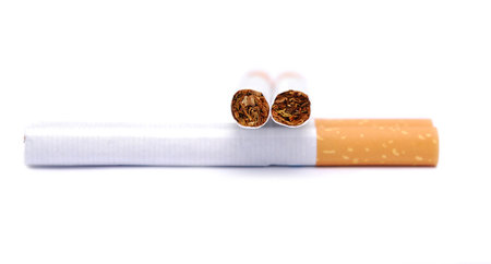 cigarette gun isolated on whiteの写真素材