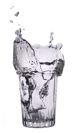 splash of water in glass over white background