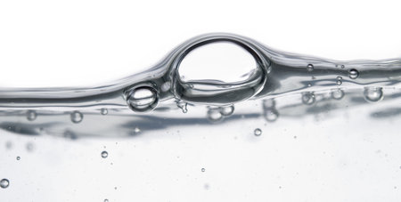 bubble and water wave over white backgroundの写真素材