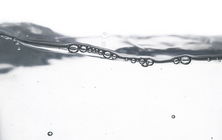 water wave and bublles over white background