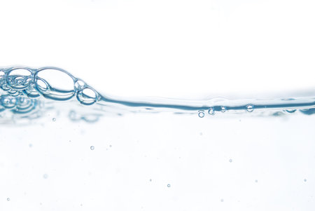 water and bubbles over white backgroundの写真素材