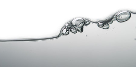 wave and bubbles over white の写真素材