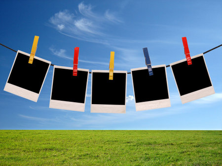 photo frames over sky background                             の写真素材