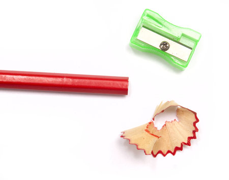 pencil, shaving and sharpener isolated on whiteの写真素材