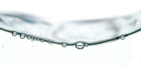 wave and bubbles isolated on whiteの写真素材